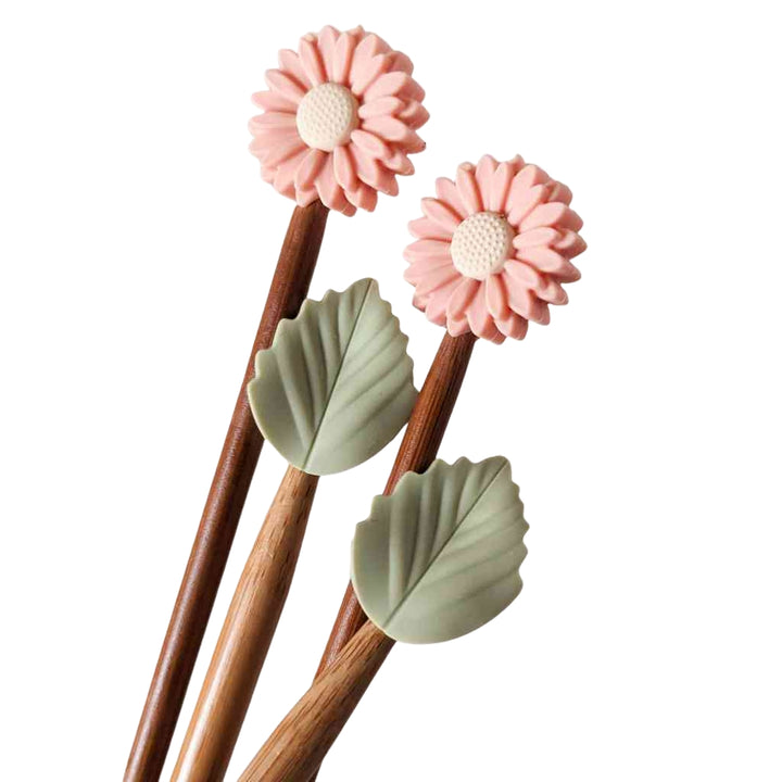 Hello Kim Nadelspitzenschoner - Gänseblümchen, Farbe Rose/Blätter – Kunststoff bei Lieblingsgarn